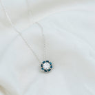 Sparkanite Jewels-Certified Moissanite Nature Inspired Pendant with London Blue Topaz